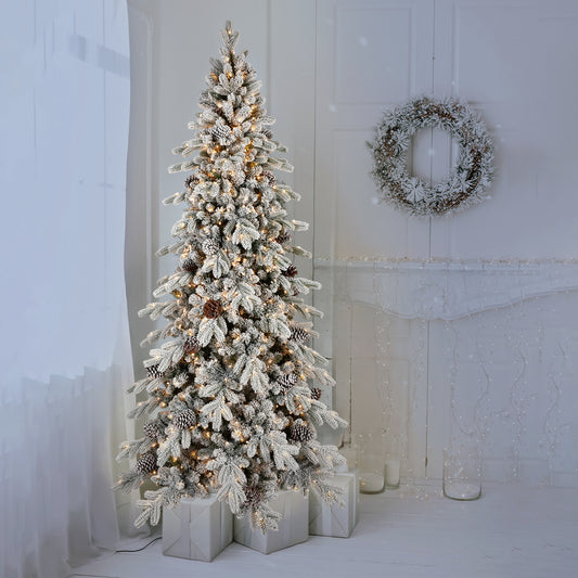 6FT Flocked PE/PVC Christmas Tree with 600 Warm White LED Lights – 935 Tips, 31 Natural Pine Cones, Snowy Effect, Hinged Branches, Metal Stand